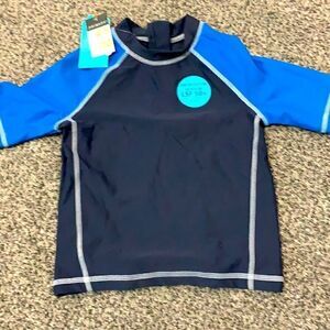 NWT Primark Blue Swimming Shirt UVF 50 - Size 4-5